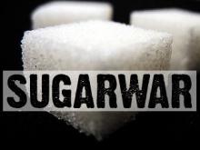 A graphic that says "Sugar war"